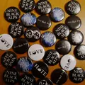 Nine Black Alps Badges 